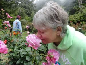 Lisa smelling the roses